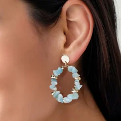 Manfield Blauwe steentjes oorbellen met goudkleurige details^ Sieraden