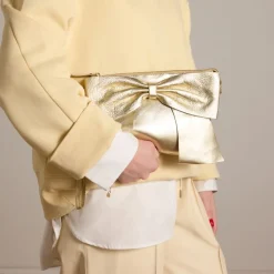 Manfield Gouden leren schoudertas met strik^ Schoudertassen