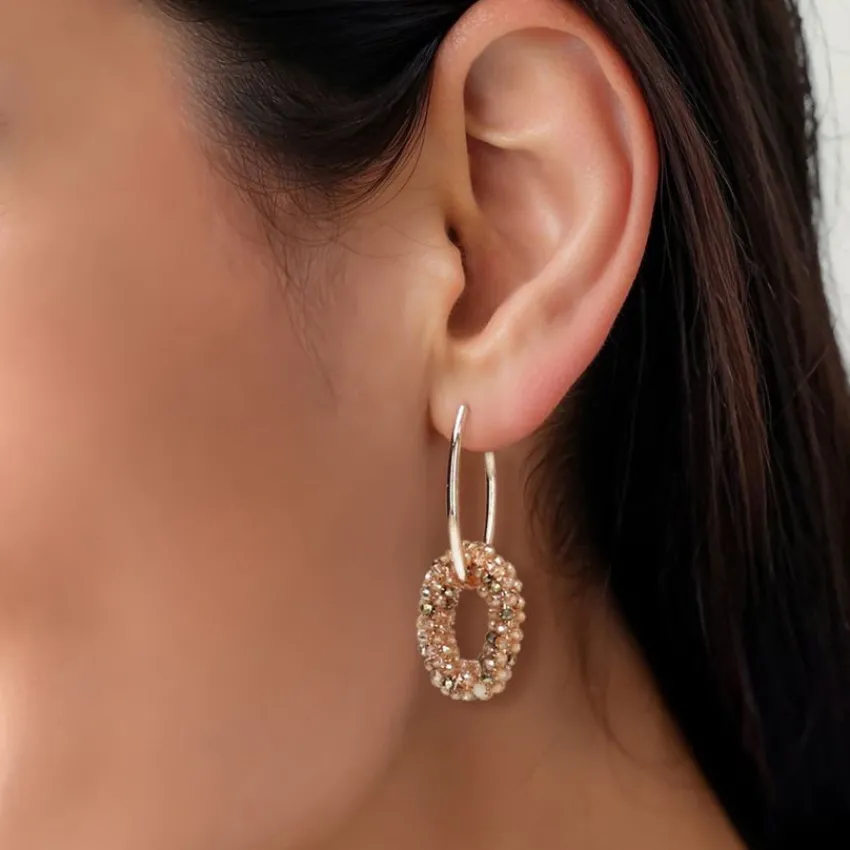 Manfield Goudkleurige oorbellen met bruine glaskraal hangers^ Sieraden